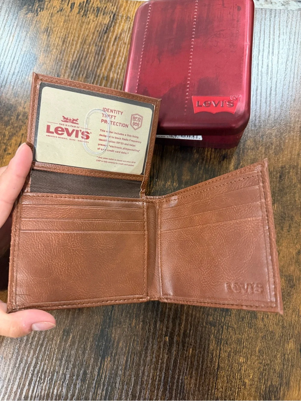 Levi's Brown Leather Bifold Wallet with Red Metal Case